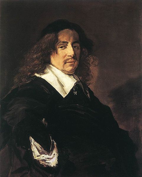 Portret van een man met lang haar en snor
